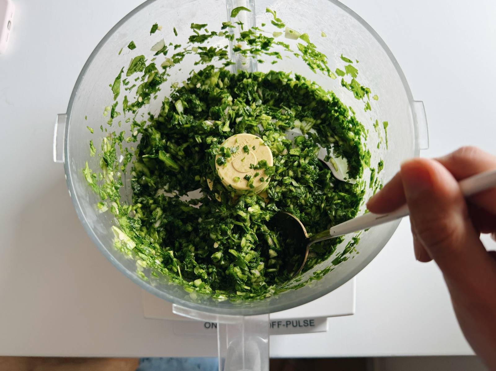Herb mixture in a food processor.