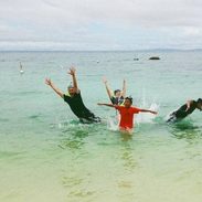 Lindsay's family in the water in Cebu.