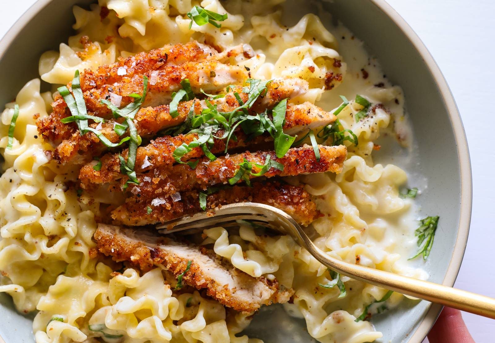 Crispy chicken on creamy lemon pasta.
