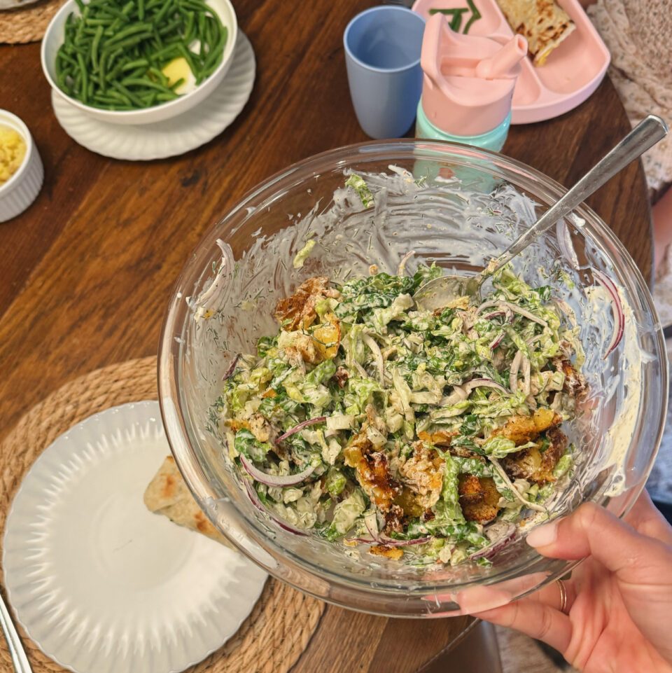 Crispy smashed potato salad in a bowl.