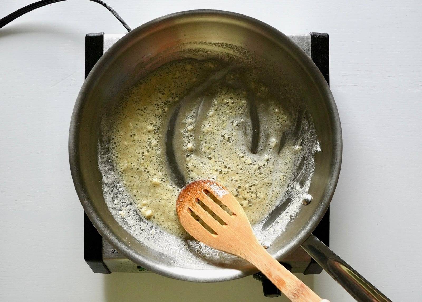 Butter, flour, and garlic in a skillet.