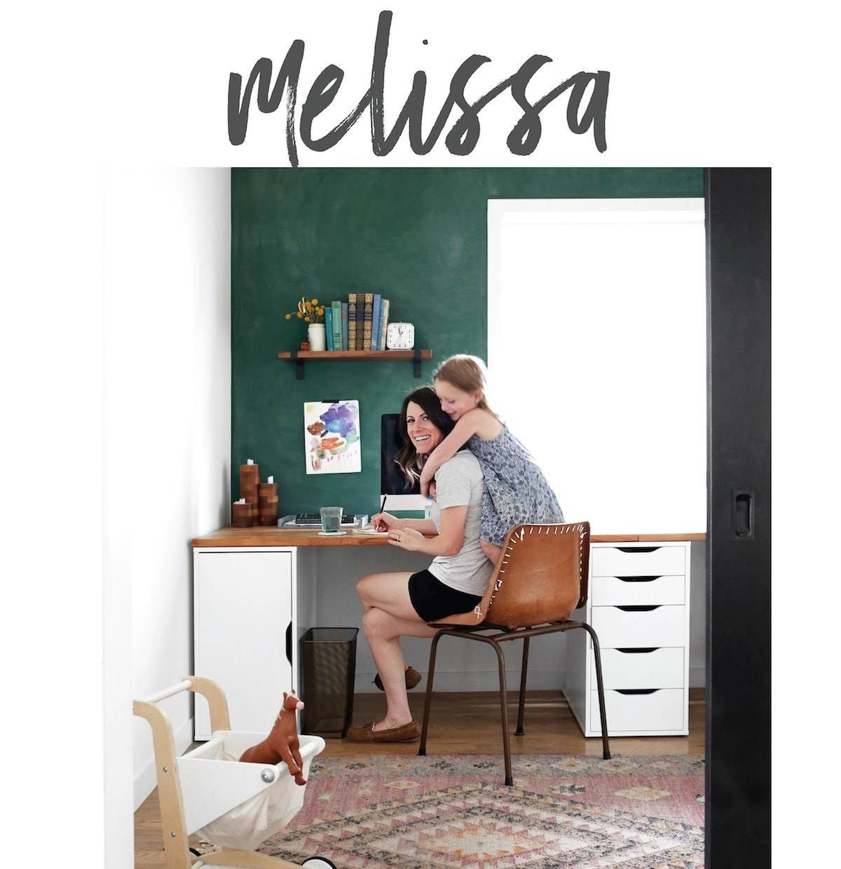 A woman smiling while being hugged by her daughter.