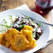 Garlic Tostones: Puerto Rican Fried Plantains perfect with rice and beans. Simple and so addicting. | pinchofyum.com