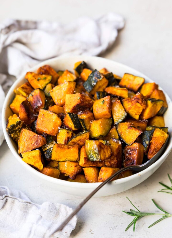 Roasted kabocha squash in a white bowl.