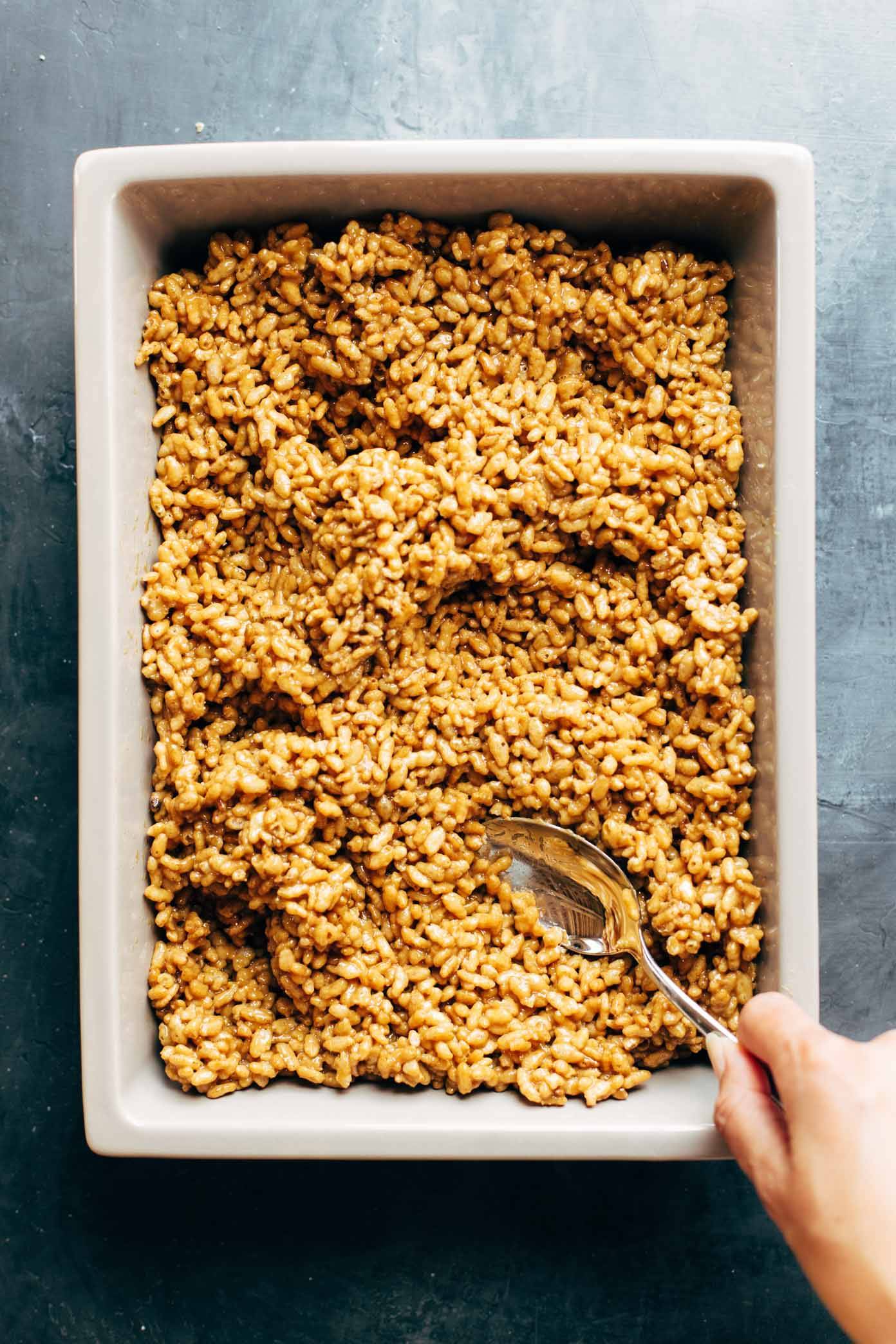 Peanut butter rice krispie bars in a pan.