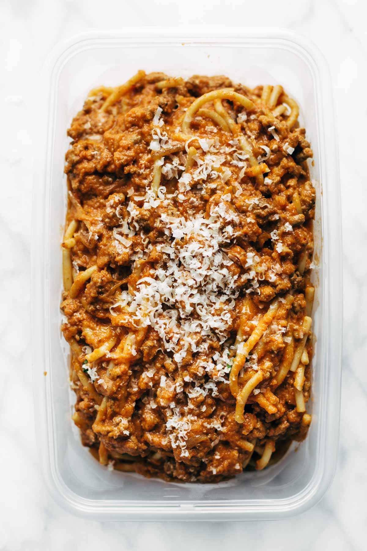 Creamy Pumpkin Spaghetti with Garlic Kale - this is the most crazy good combination! Spicy turkey, creamy pumpkin sauce, and pasta! | pinchofyum.com