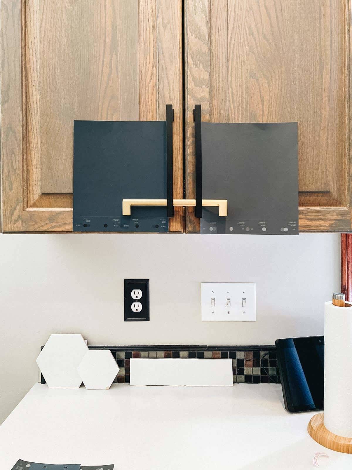 Cabinets above a washing machine in a laundry room..