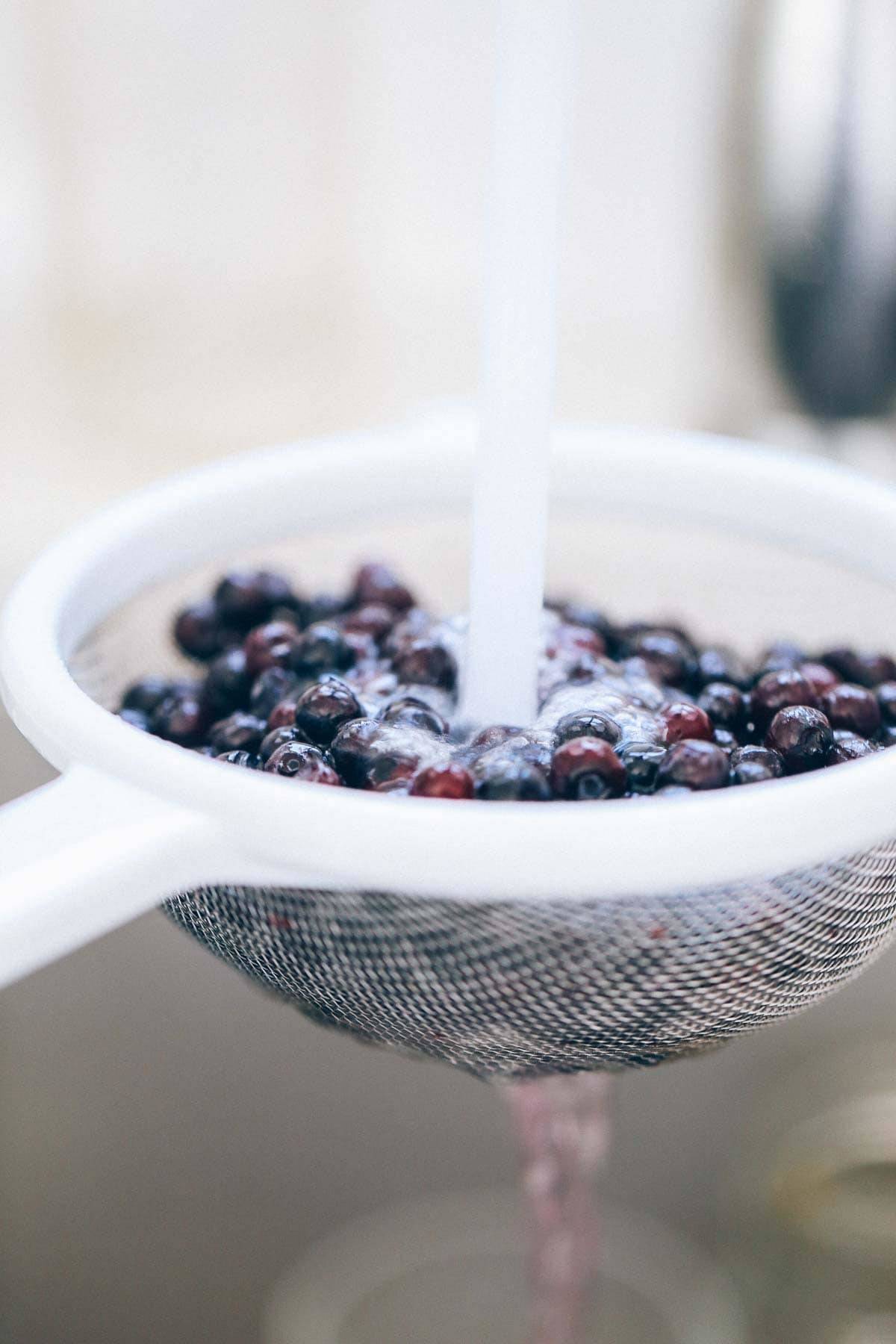 Blueberries in a strainer.